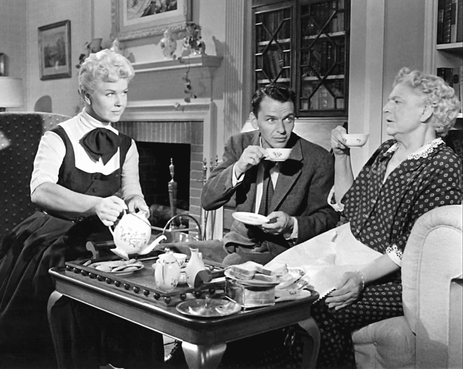 Ethel Barrymore in a film scene, looking elegant.